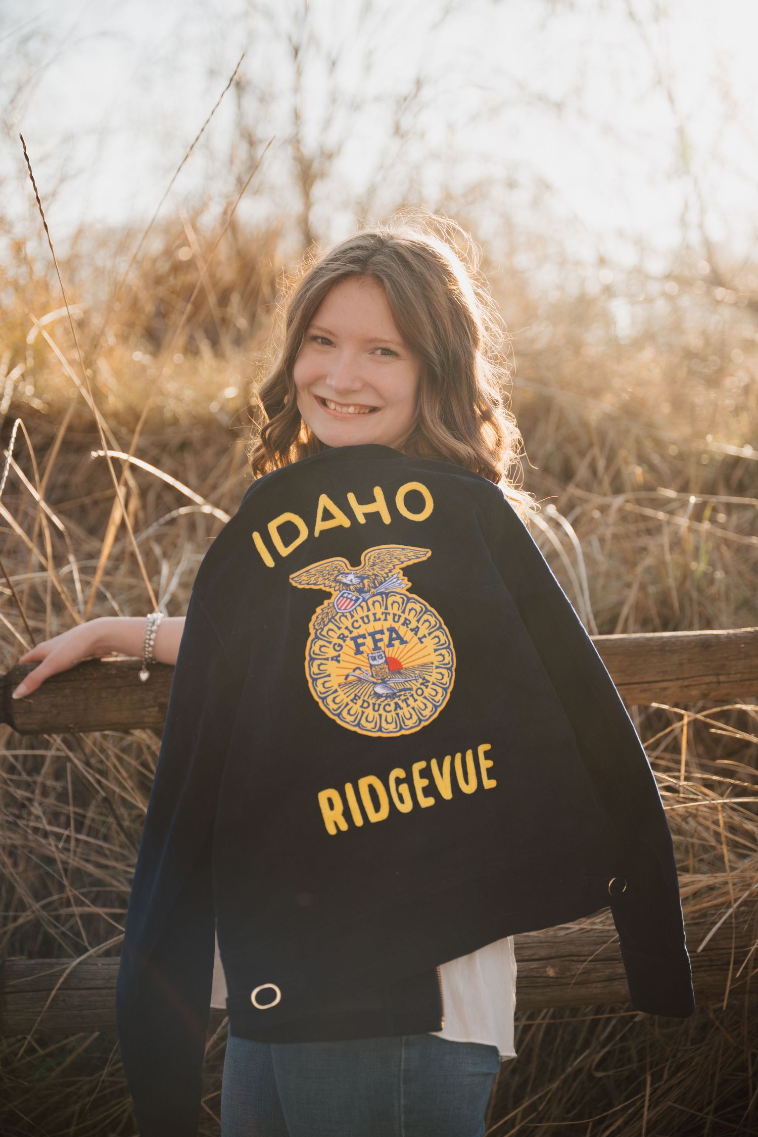 FFA jacket with Idaho Ridgevue emblem shown in outdoor setting.