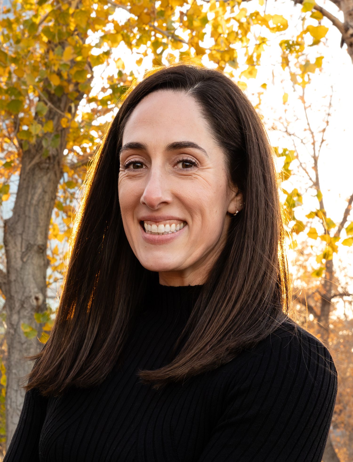 Best Corporate headshot, Denver, Co of project manager for website, email, pamphlets and online profiles outdoors against autumn background