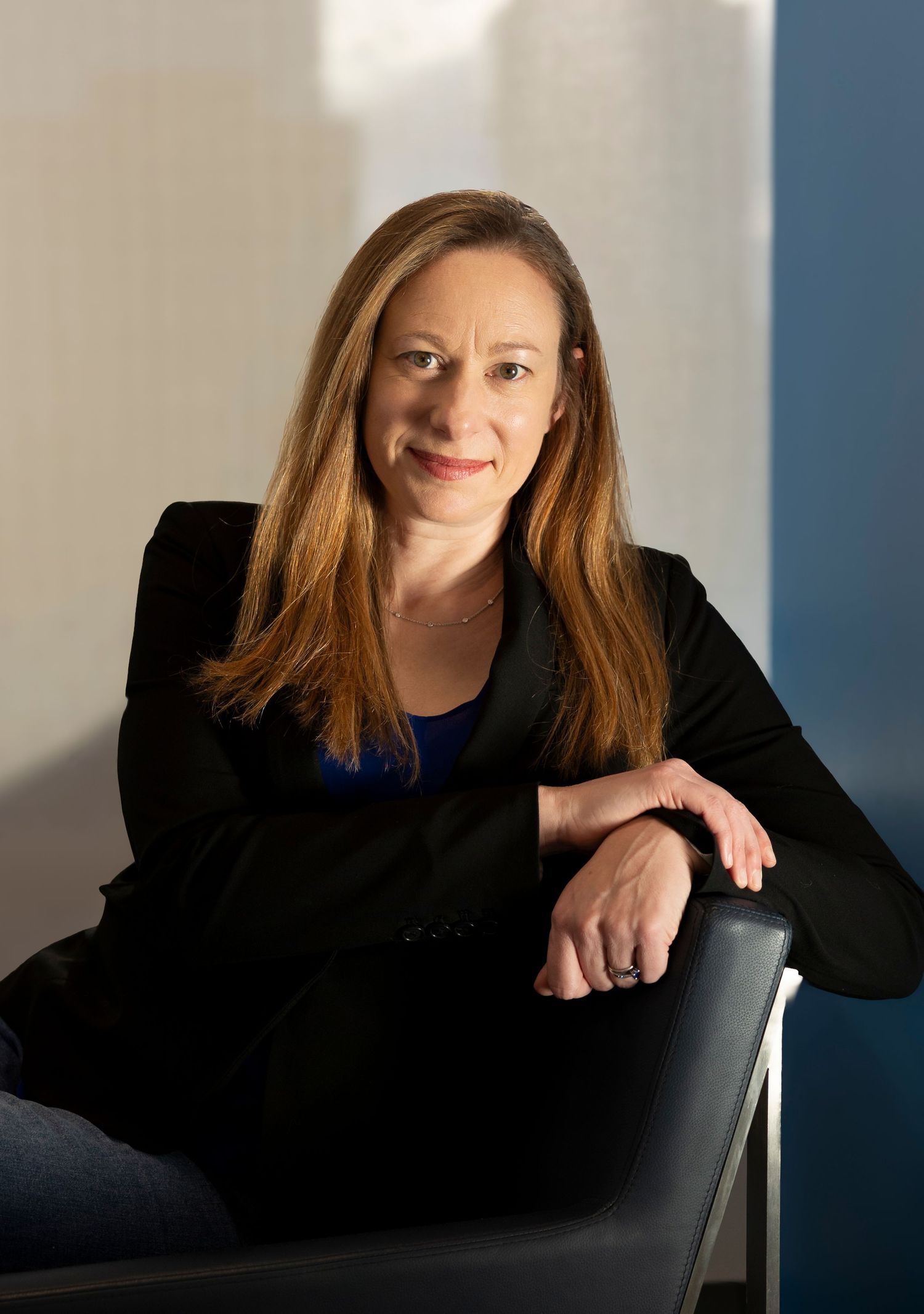 Striking a balance between professional and approachable with a natural light artistic headshot portrait session in Arvada, Colorado.