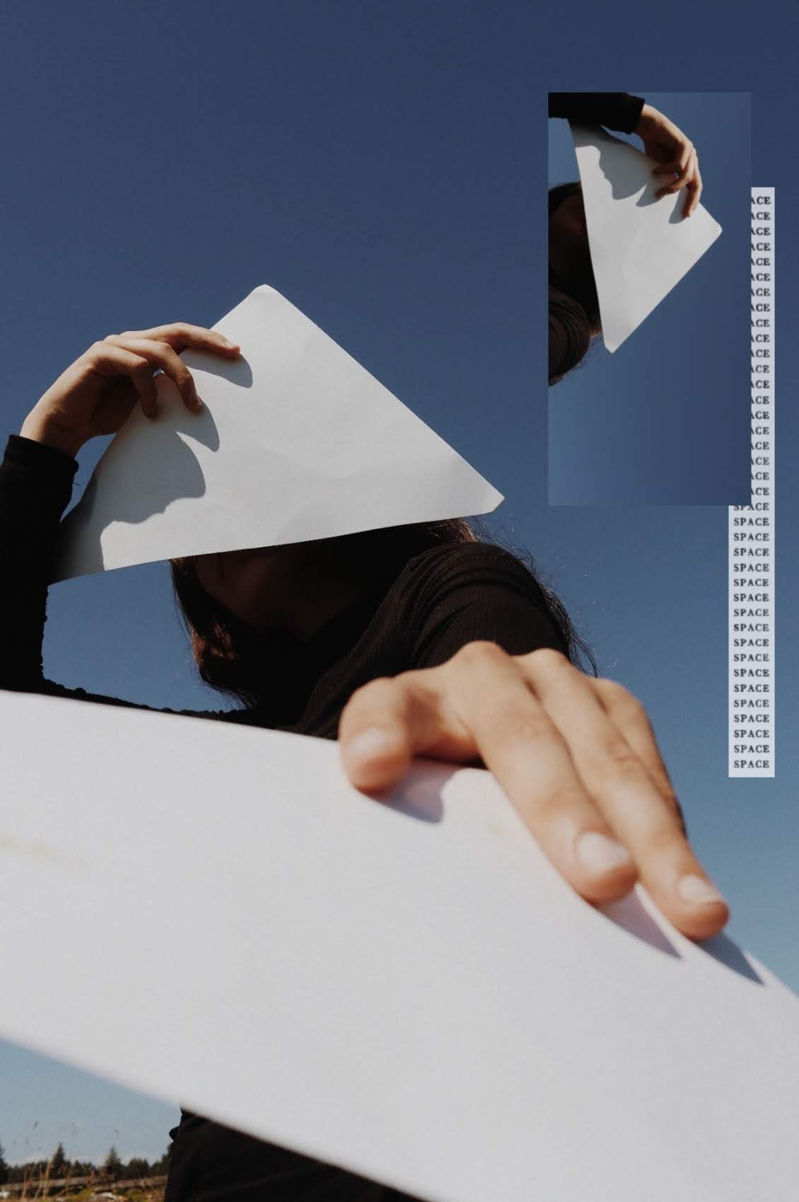 Creative collage of hands holding white paper sheets against a clear blue sky with text overlay.