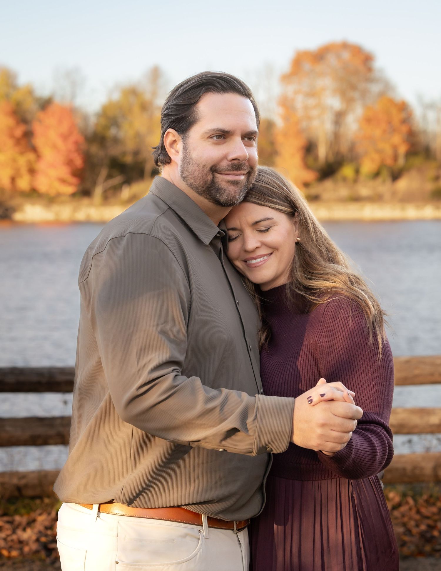 Husband and wife fall session in Menomonee Park, WI. Romantic, heartfelt outdoor portraits with golden autumn light and warm tones.