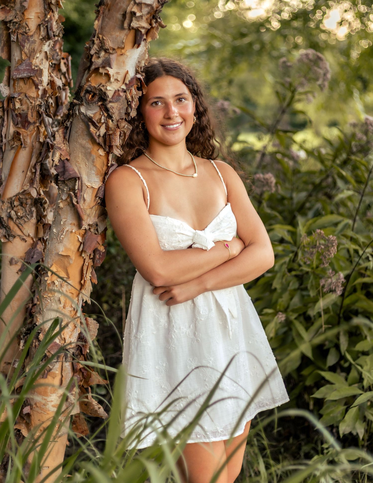 Senior session in Wauwatosa. Girl in white dress, bright and vibrant photography capturing confidence, style, and individuality.