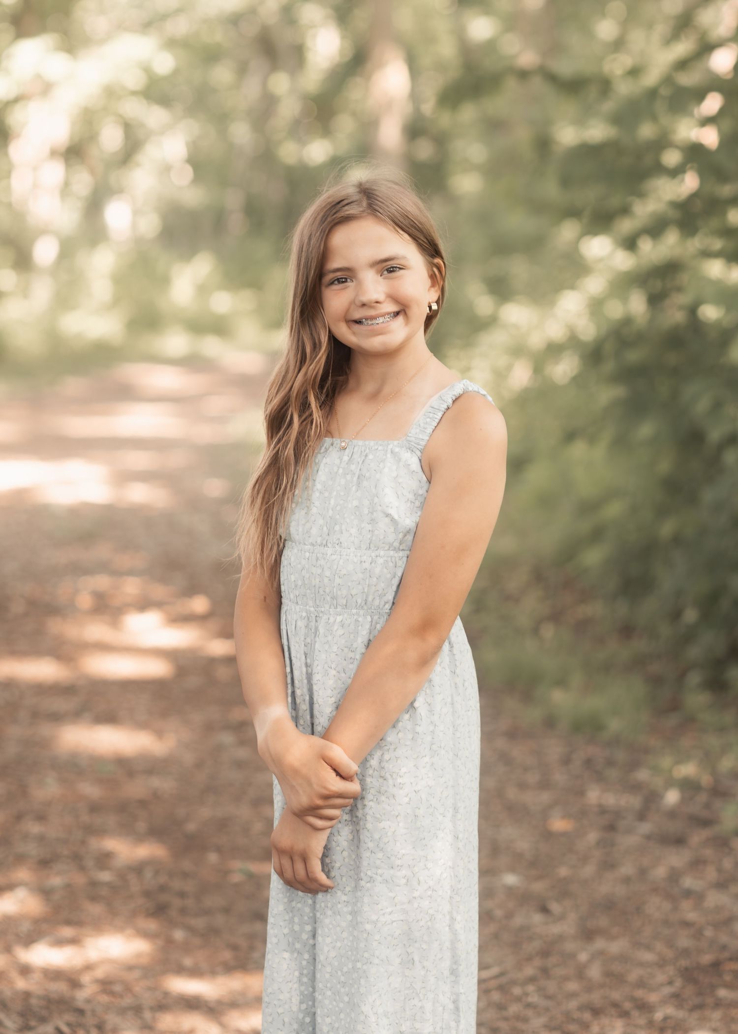 Young girl portrait in Menomonee Park, Waukesha. Capturing joyful, natural moments in warm, timeless family photography style.