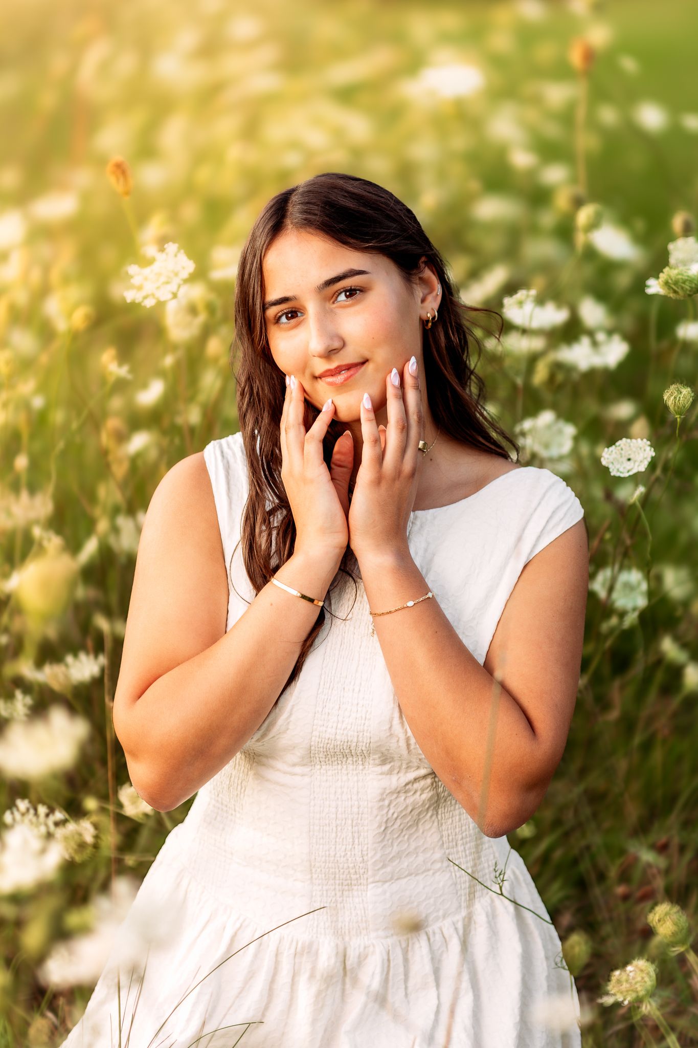 Senior portrait in Hartland among trees and open fields. Beautiful, natural, and warm photography celebrating individuality and milestones.