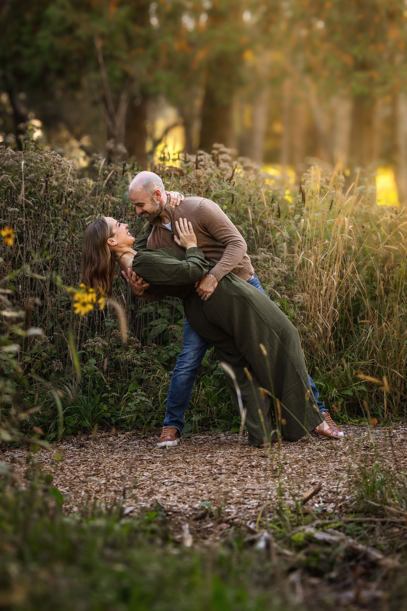 Romantic moment of a couple in Retzer Park, Waukesha. Timeless, heartwarming photography that celebrates connection and joy.