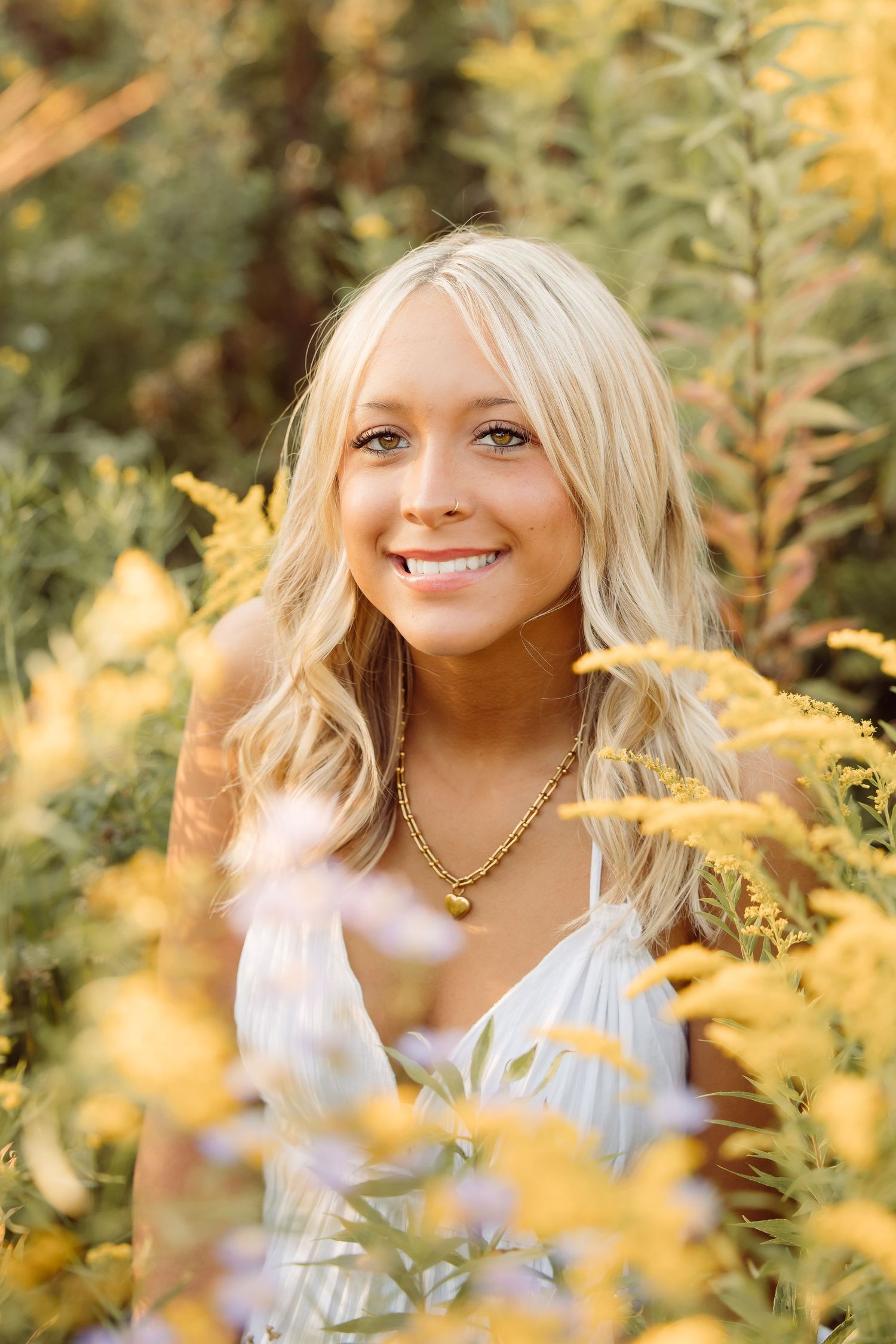 Senior session at Retzer Nature Center, Waukesha. Long-haired blonde teen captured in warm, glow, and heartfelt outdoor photography.