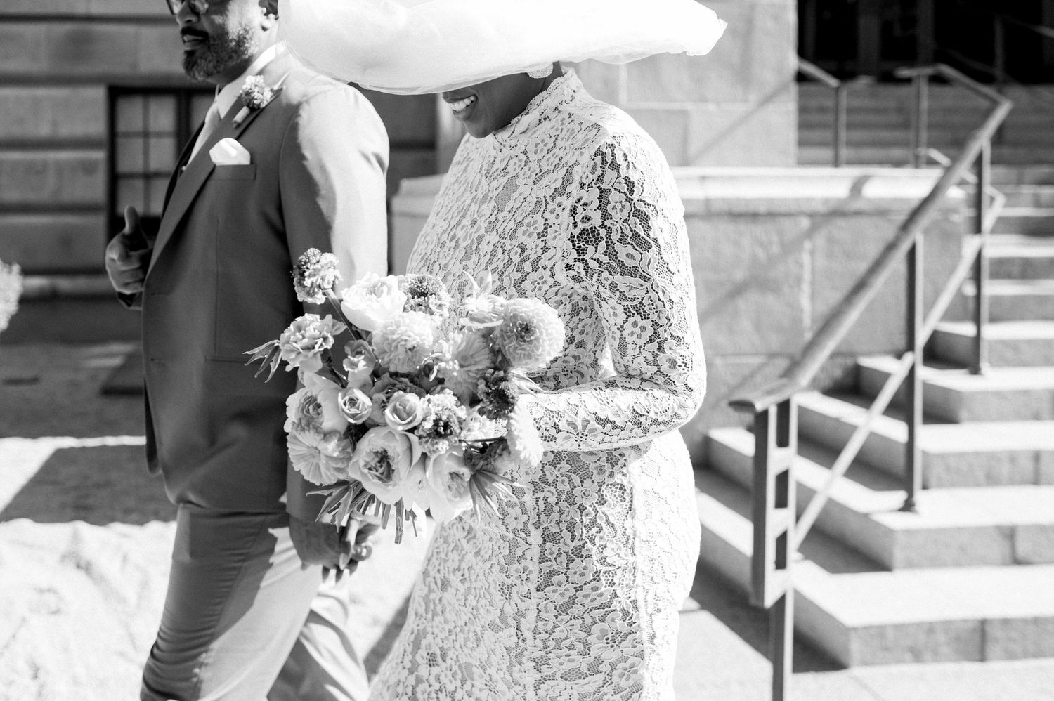 A black and white wedding photo collage showing multiple moments from a ceremony and celebration.
