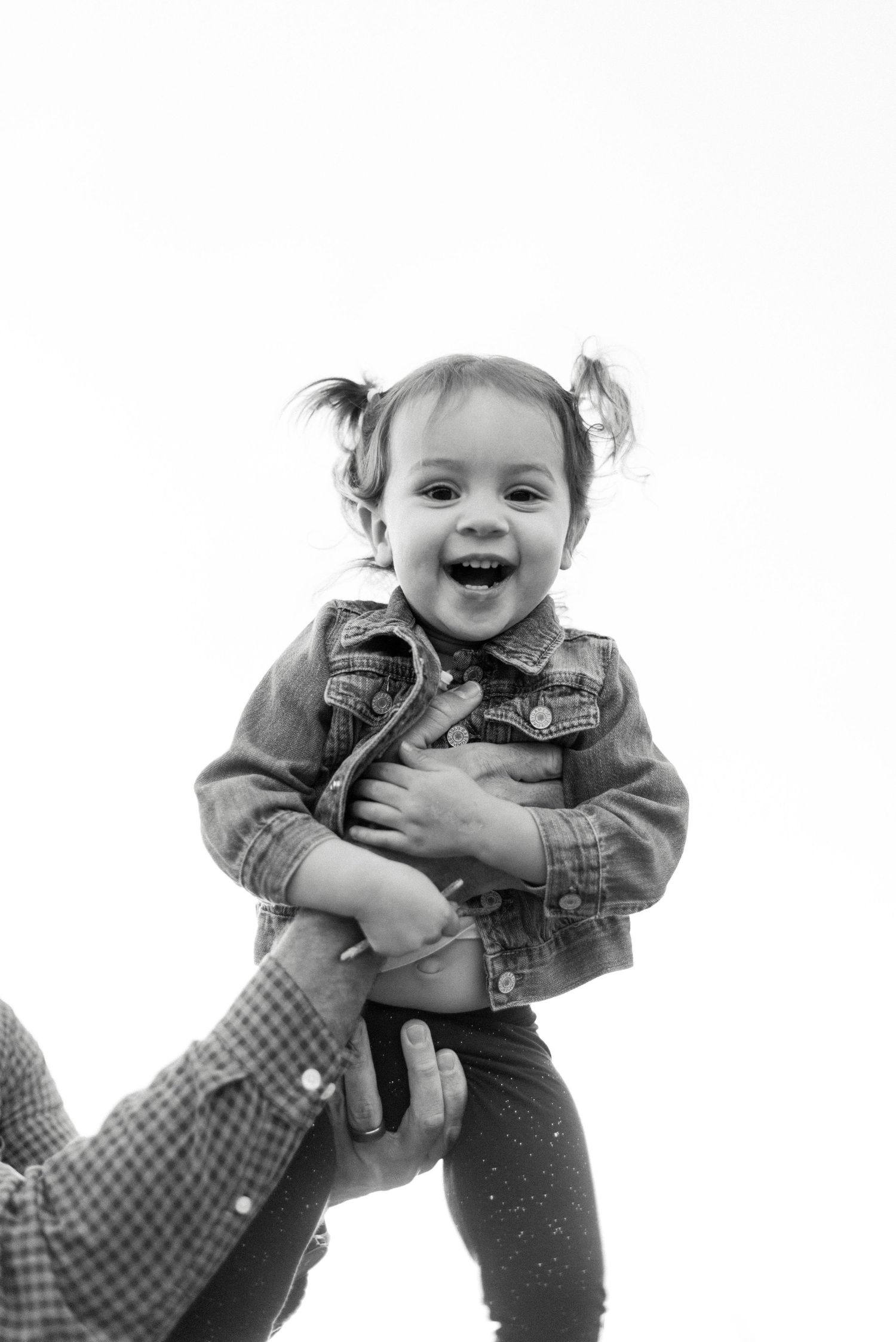 cute smiling little girl in the air