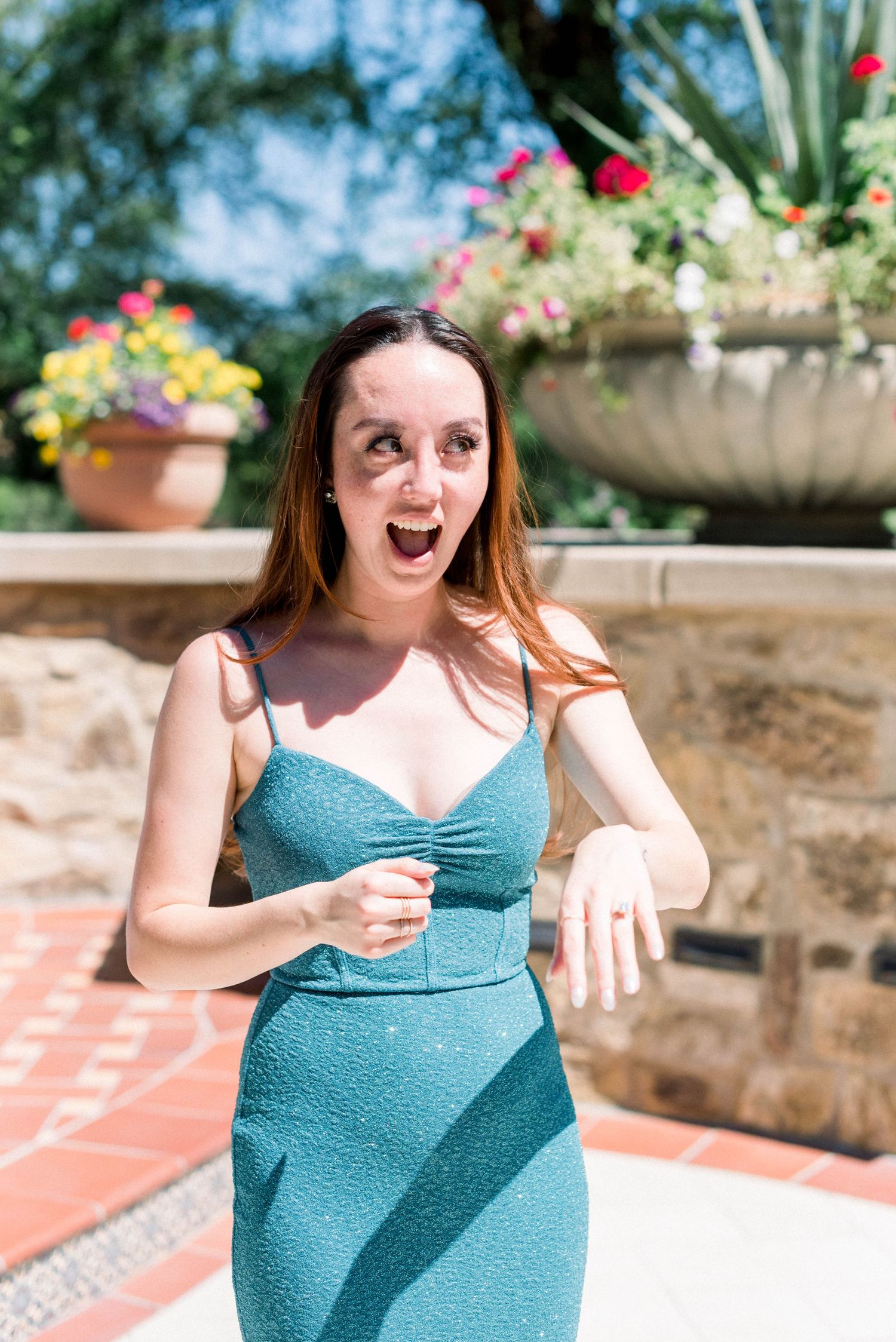 An excited reaction showing pure joy during a proposal moment.