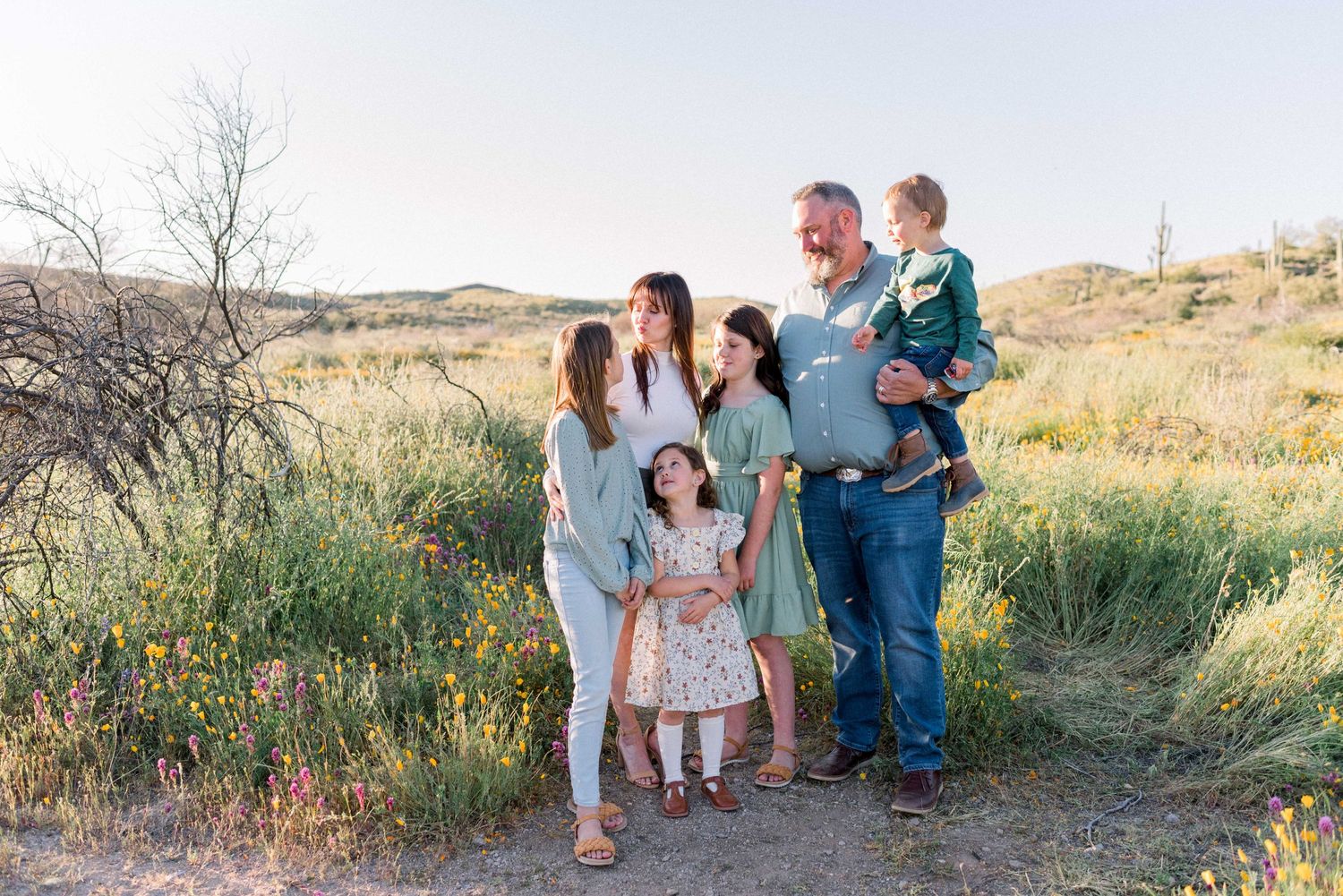 Cute family photo in a field