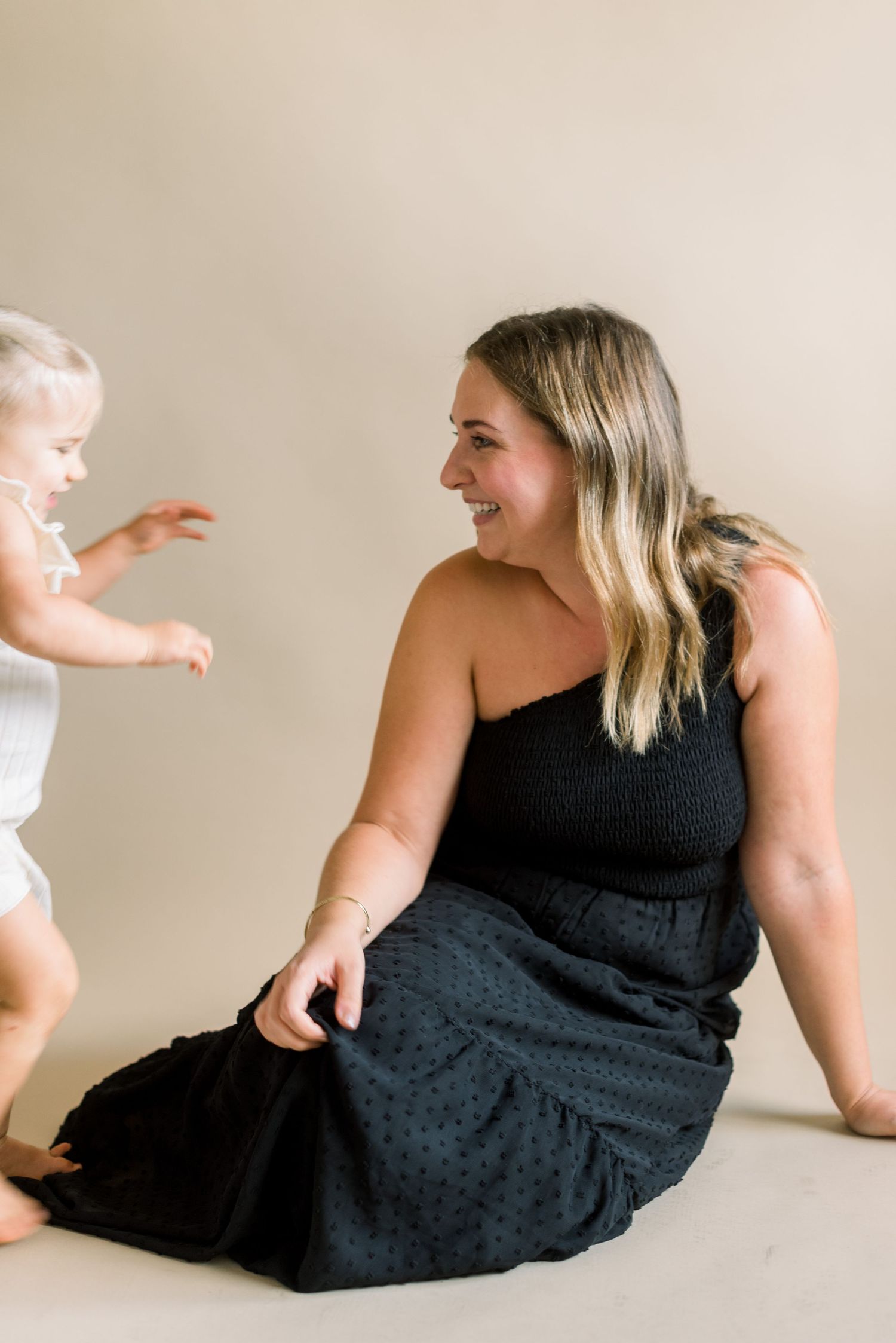 A heartwarming candid moment captured between two people during a photo session.