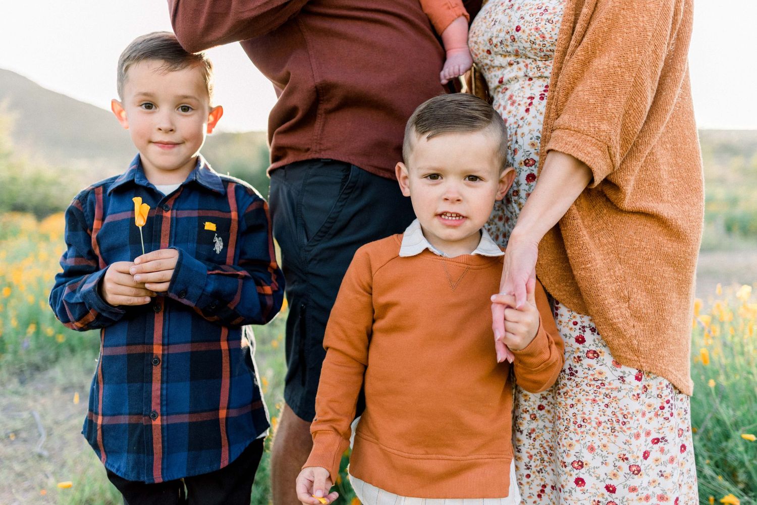 family photo of brothers looking at camera