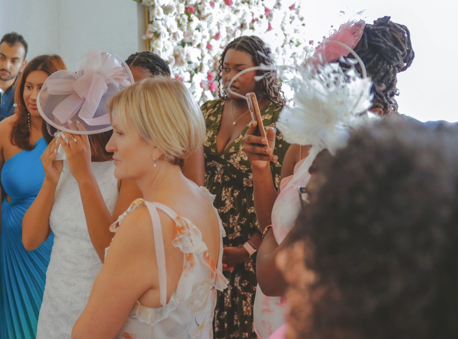 Guests celebrating and interacting during a lively bridal shower event in Calgary, photographed in a candid style
