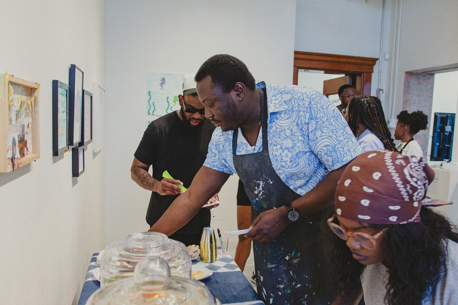 Guest interacting and participating during a creative group event, captured in a candid style by a Calgary event photographer