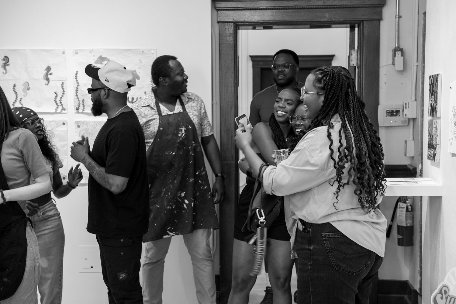 Guest interacting and participating during a creative group event, captured in a candid style by a Calgary event photographer