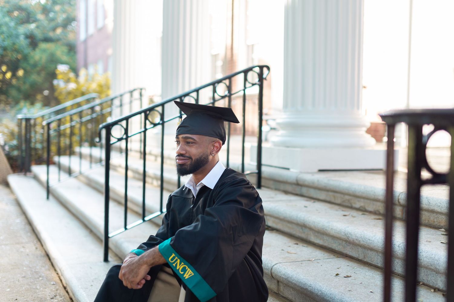 A collection of candid shots showing someone in casual attire walking near white columns outdoors.