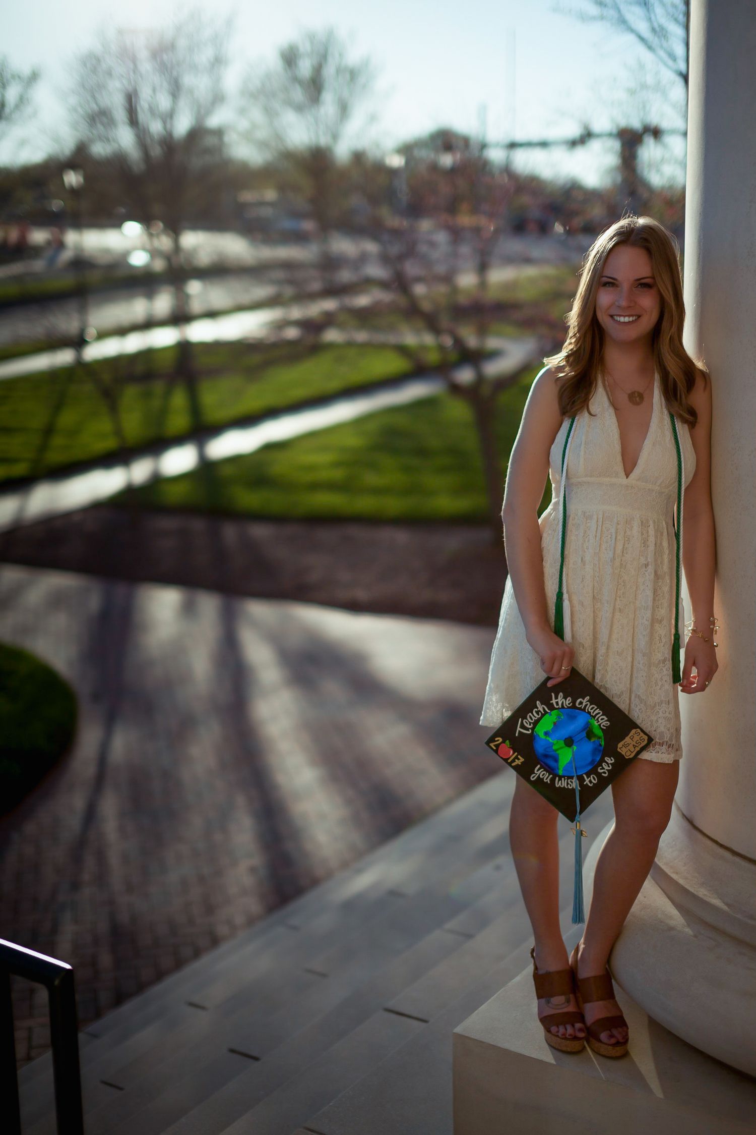 A series of photos showing someone in a white dress walking and posing on outdoor concrete steps.