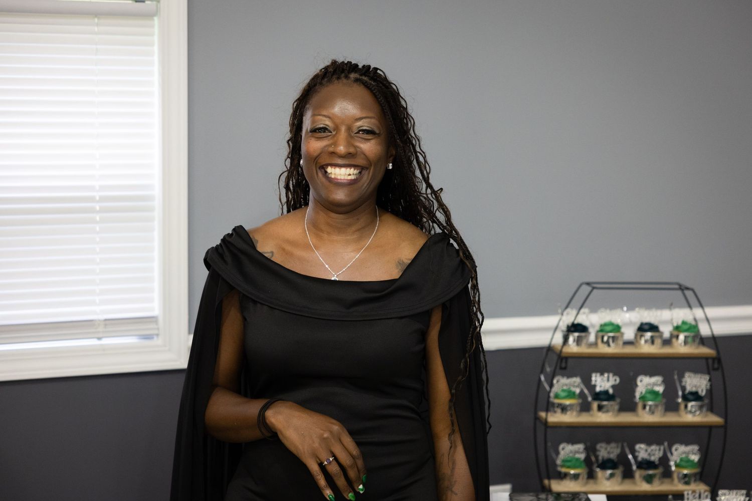 Series of portrait shots showing joyful expressions against a grey background.
