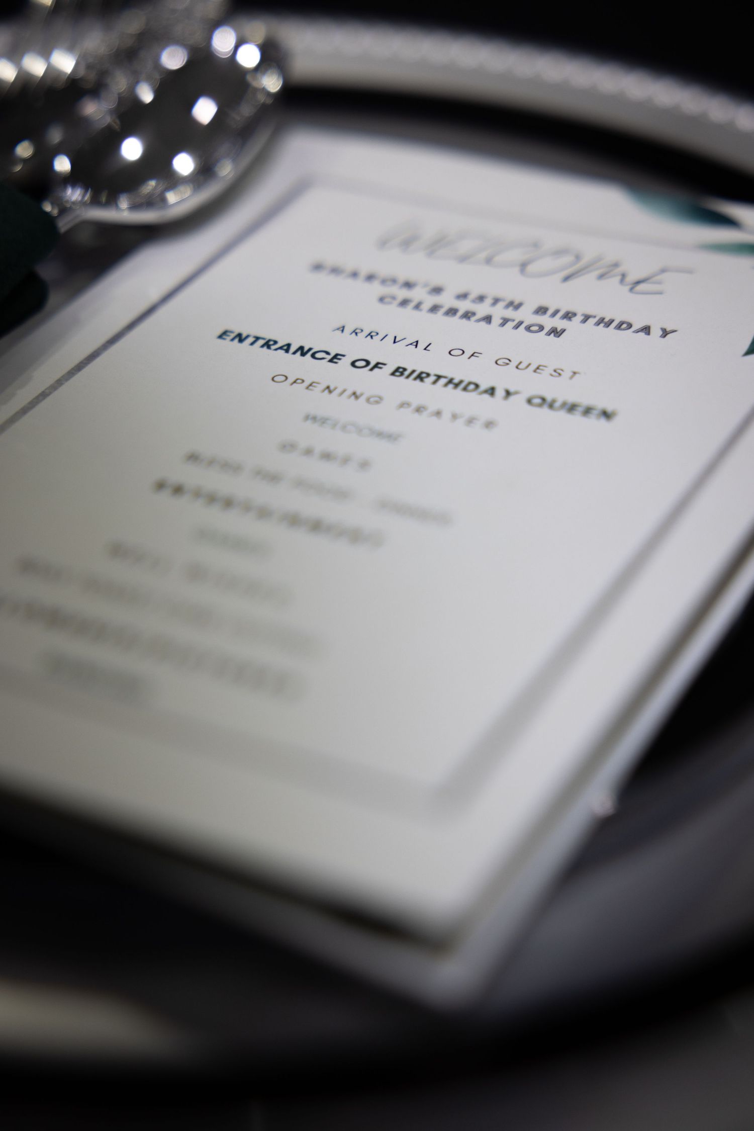 Close-up of elegant birthday celebration invitation cards with selective focus.