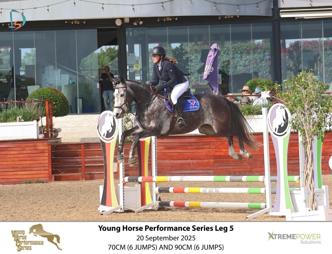 Rider on dark horse competing at Young Horse Performance Series Leg 5 show jumping event September 20 2025.
