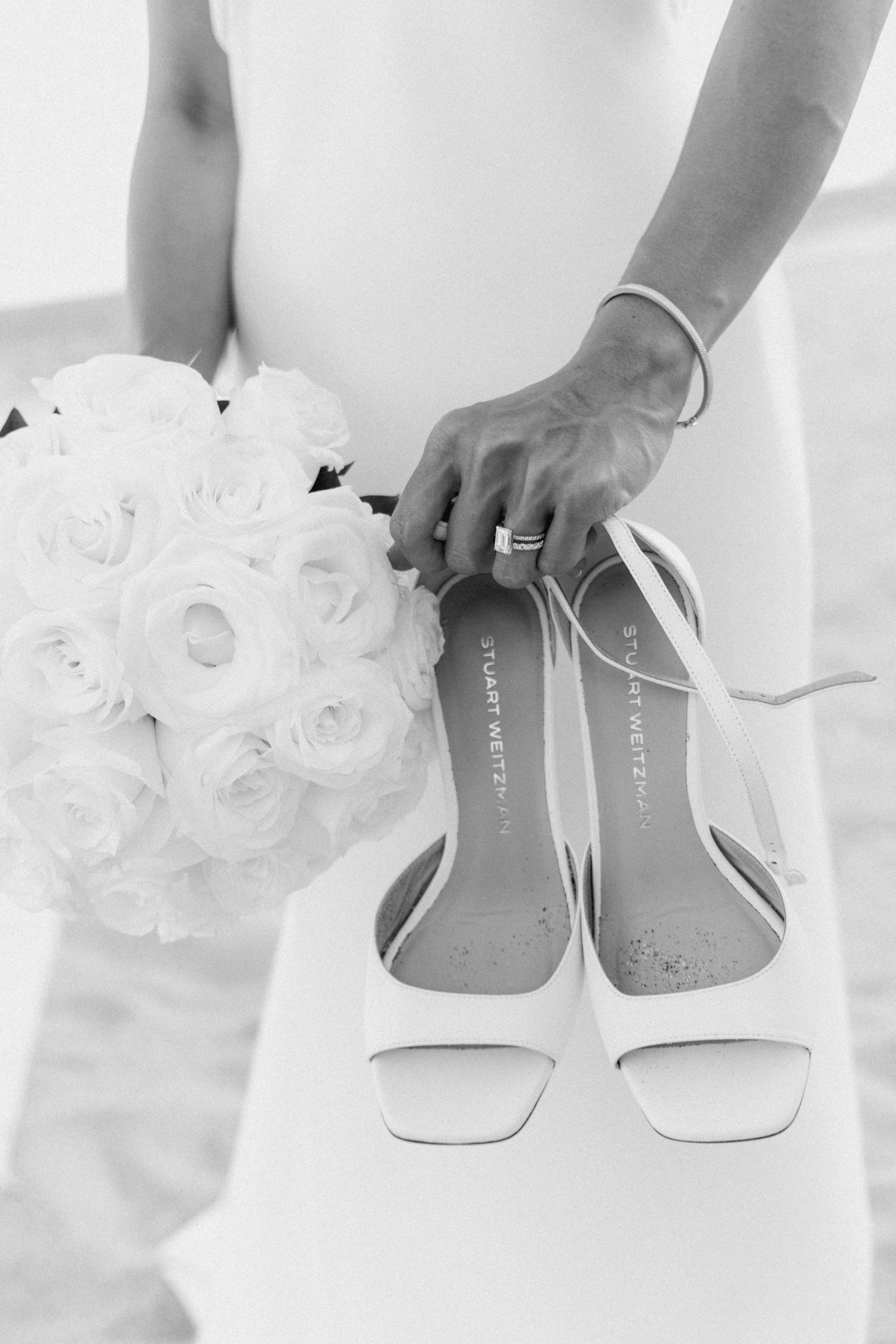 White bridal flats with rose decorations displayed in multiple angles.