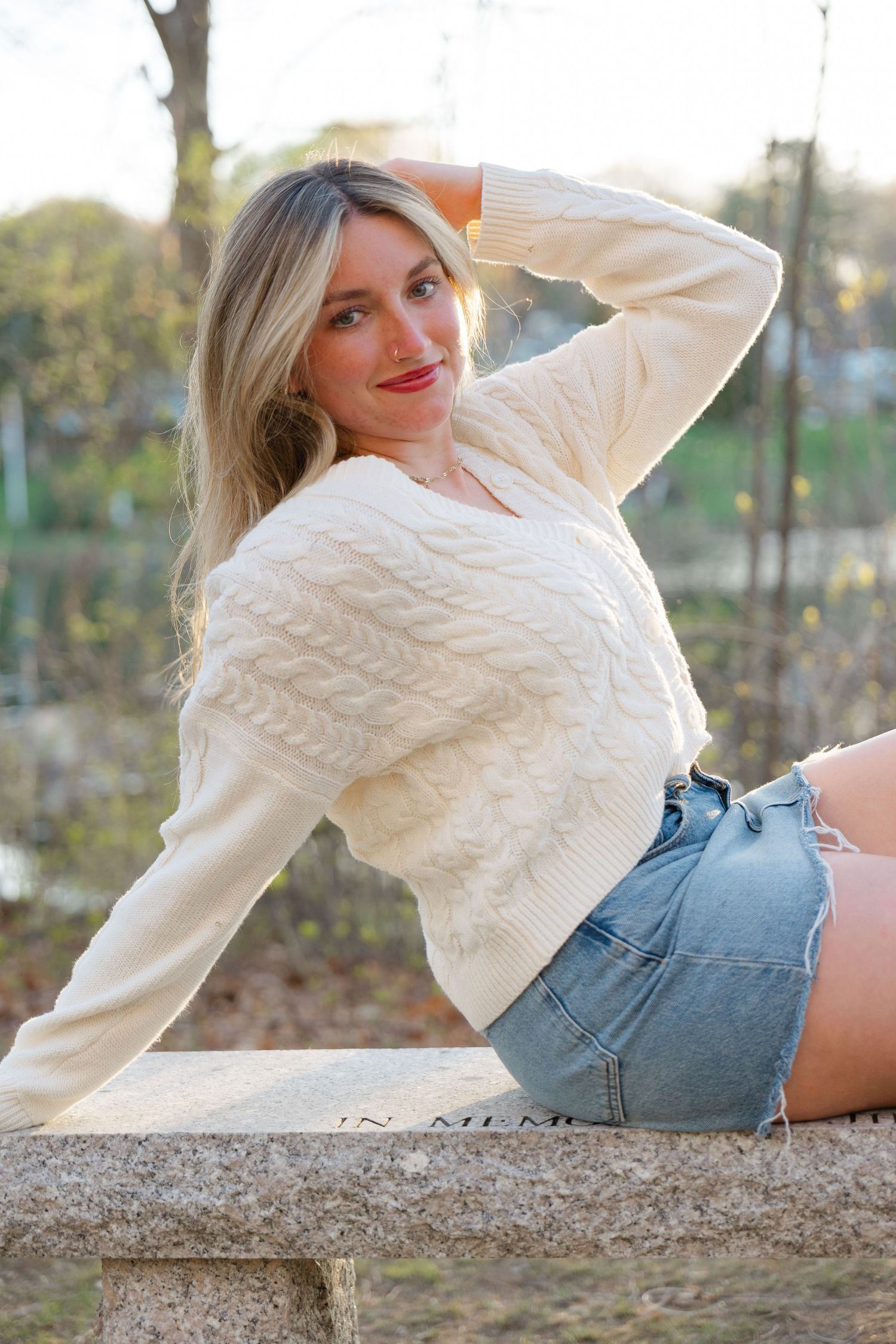 Lifestyle senior photography session in Massachusetts with candid outdoor portraits during golden hour.