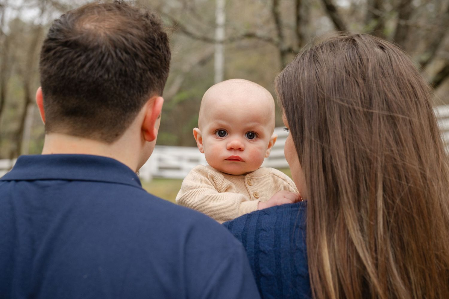 Outdoor family photography session in Massachusetts capturing candid moments with natural light and lifestyle posing.