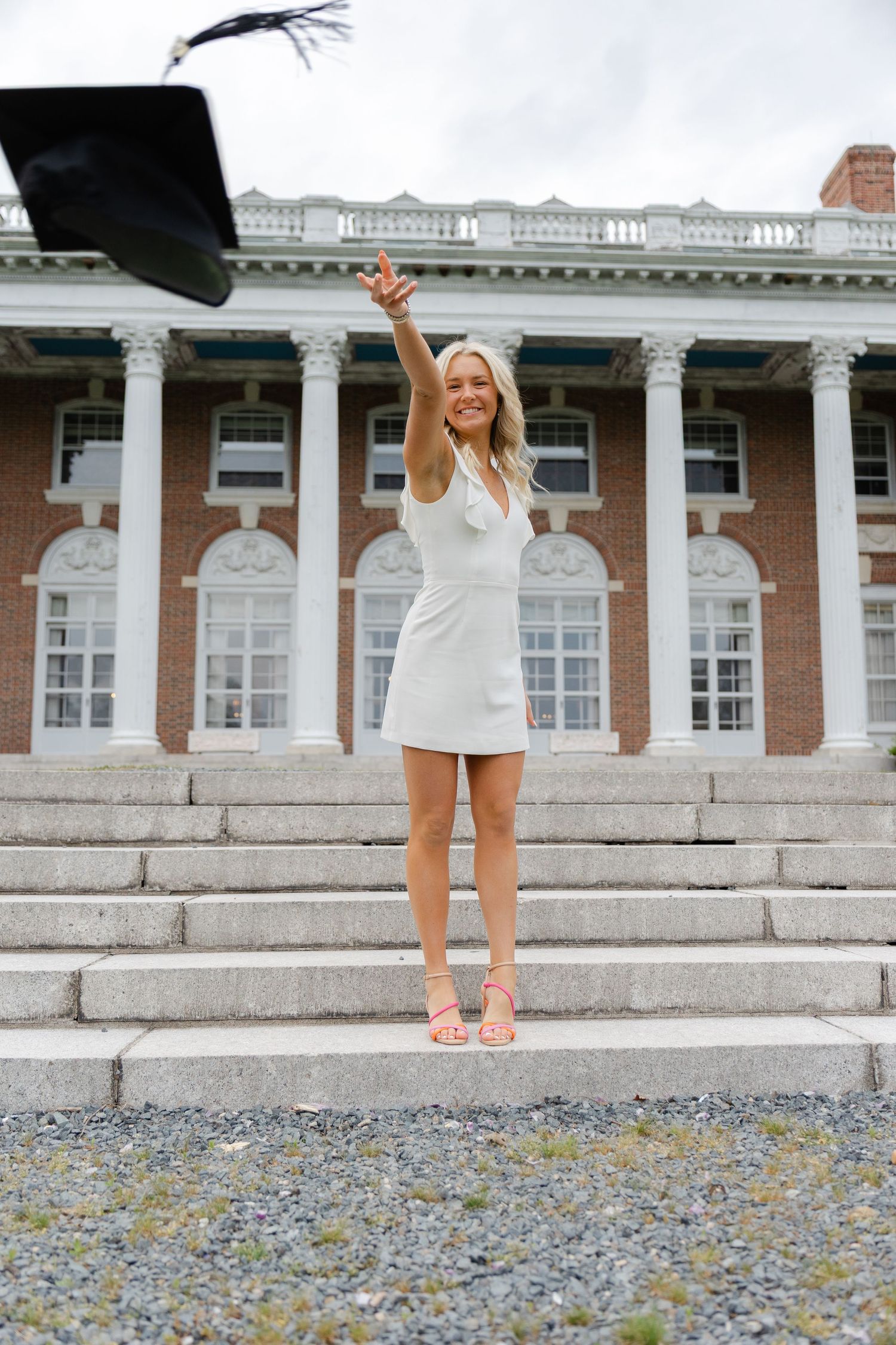Senior graduation photography session in Massachusetts featuring natural light portraits and campus scenery.
