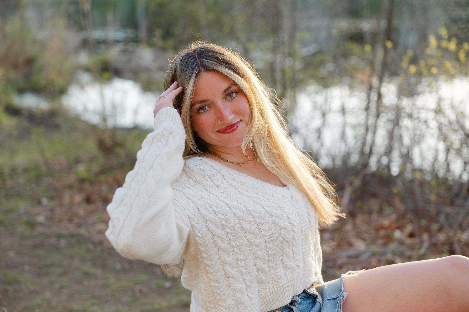 Lifestyle senior photography session in Massachusetts with candid outdoor portraits during golden hour.