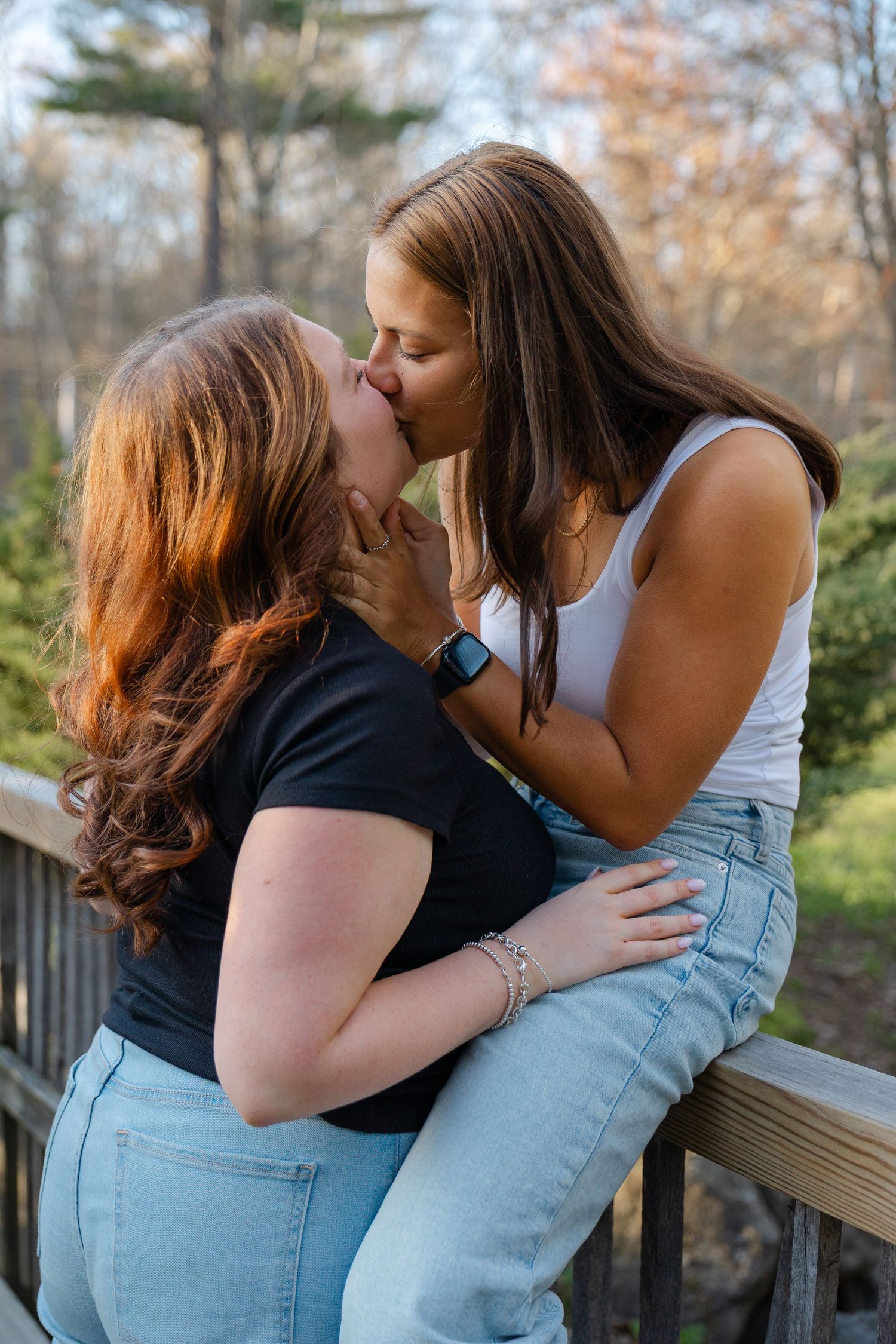 Couples photography session in Massachusetts capturing candid outdoor moments during golden hour.