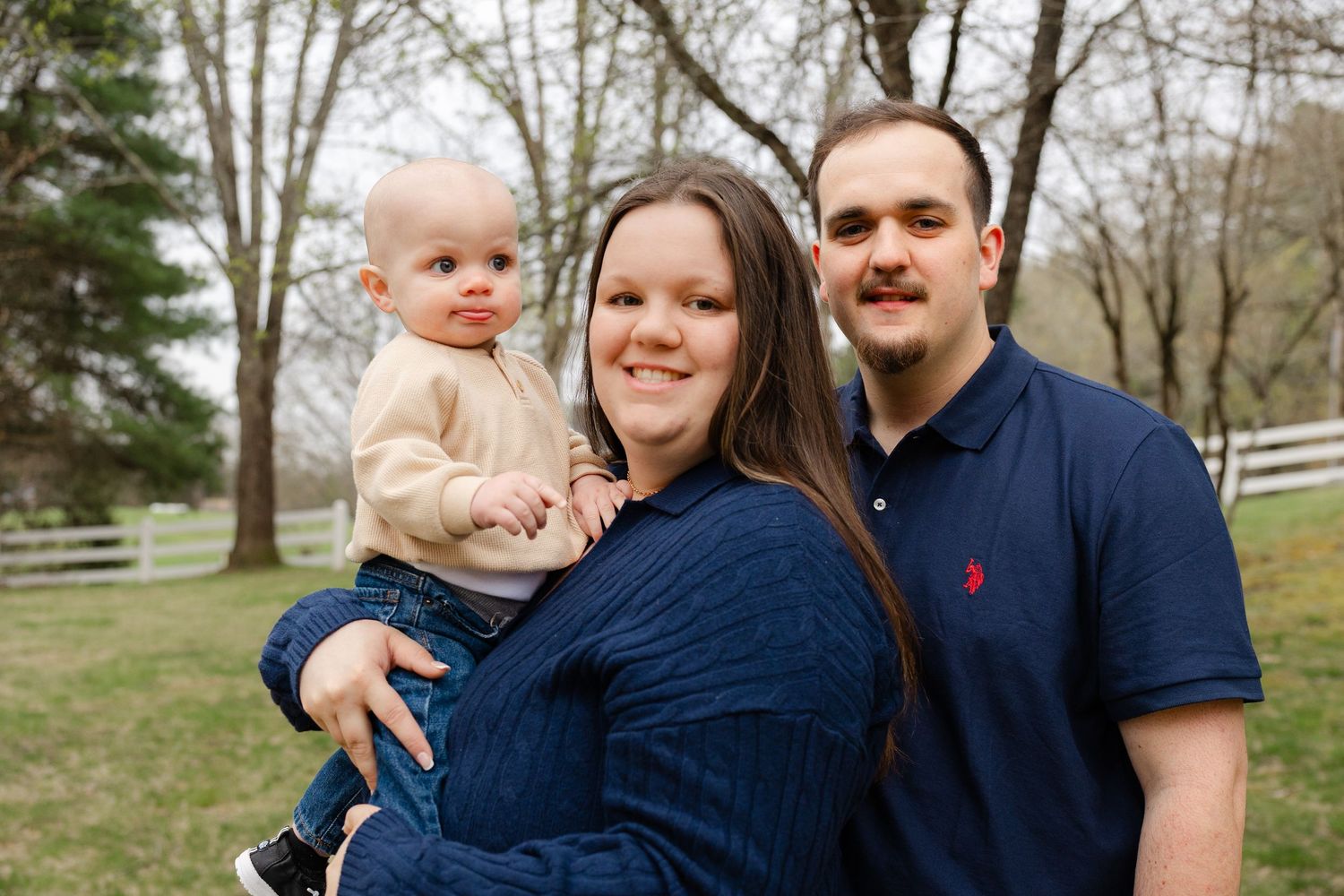 Outdoor family photography session in Massachusetts capturing candid moments with natural light and lifestyle posing.
