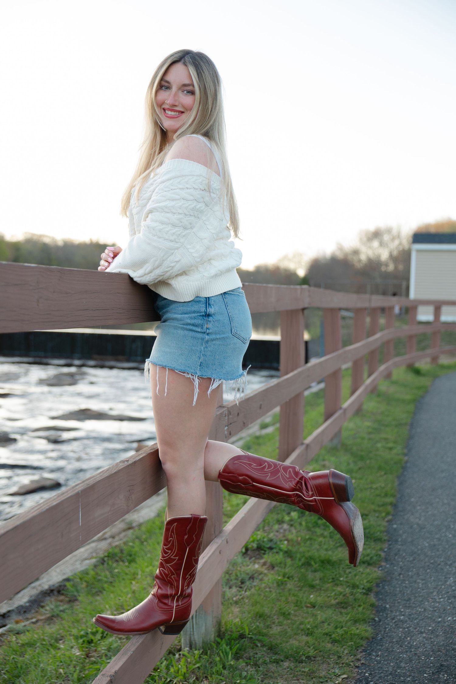 Lifestyle senior photography session in Massachusetts with candid outdoor portraits during golden hour.