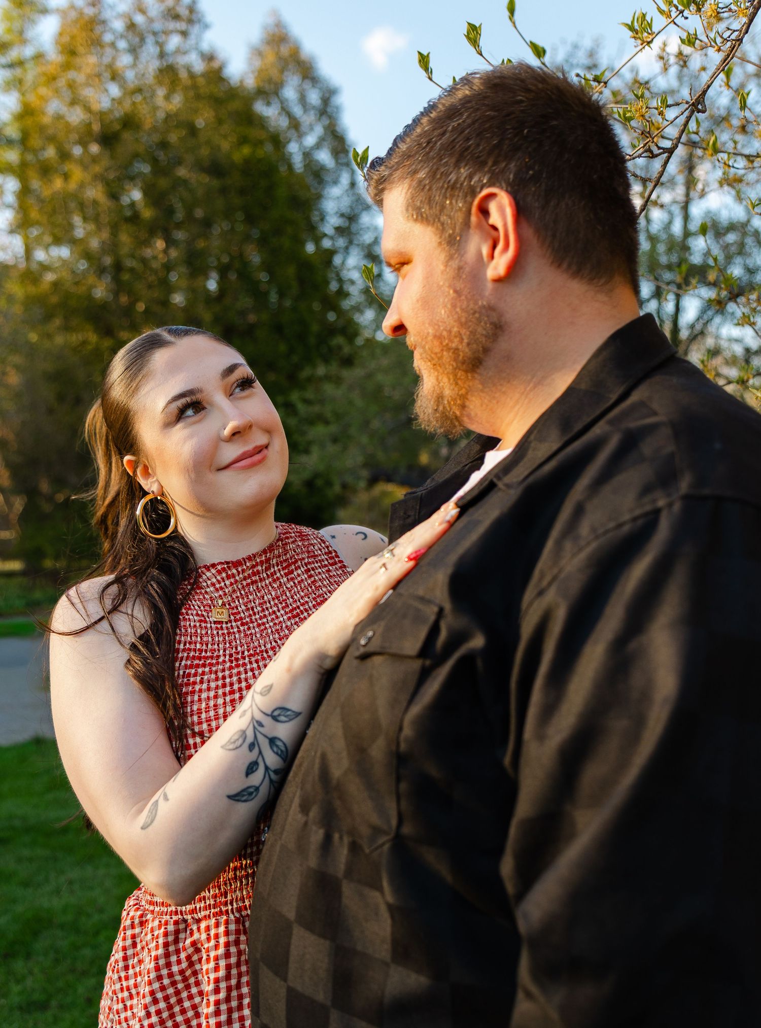Outdoor couples photography session in Massachusetts capturing warm, candid moments during golden hour.