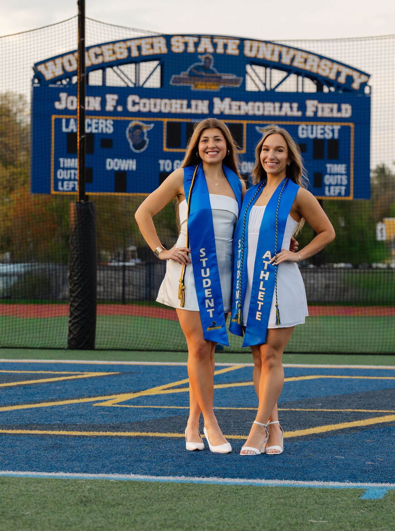 Senior graduation photography session in Massachusetts featuring natural light portraits and campus scenery.
