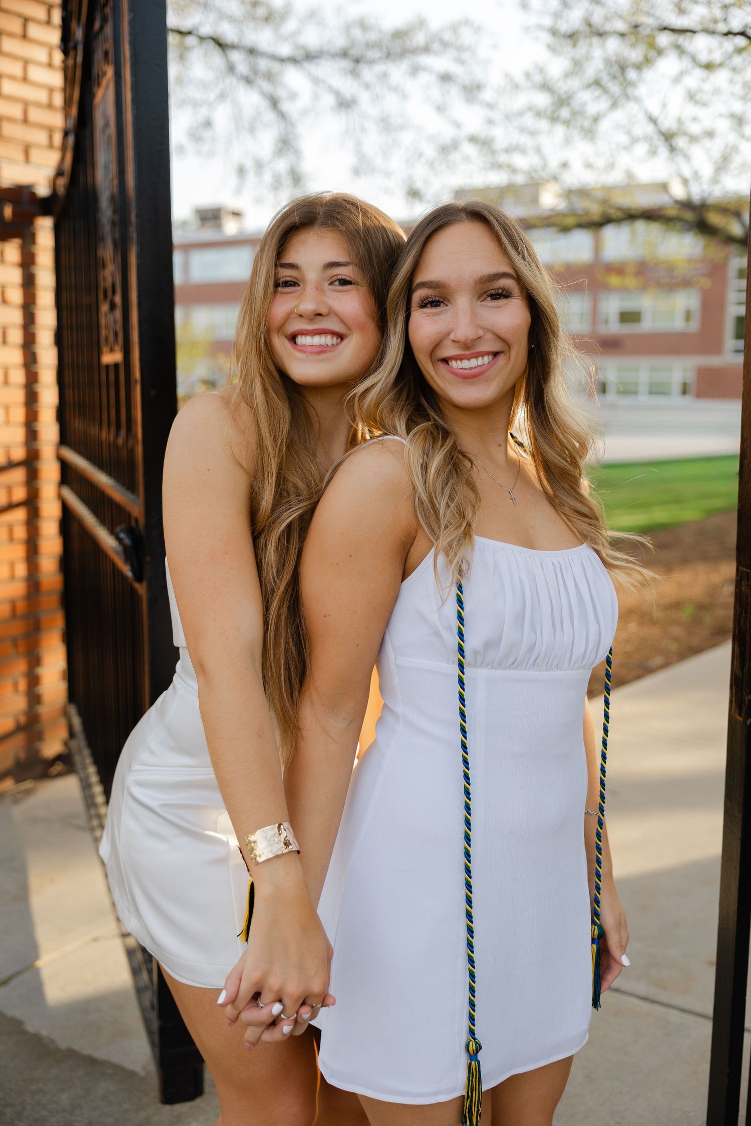 Senior graduation photography session in Massachusetts featuring natural light portraits and campus scenery.