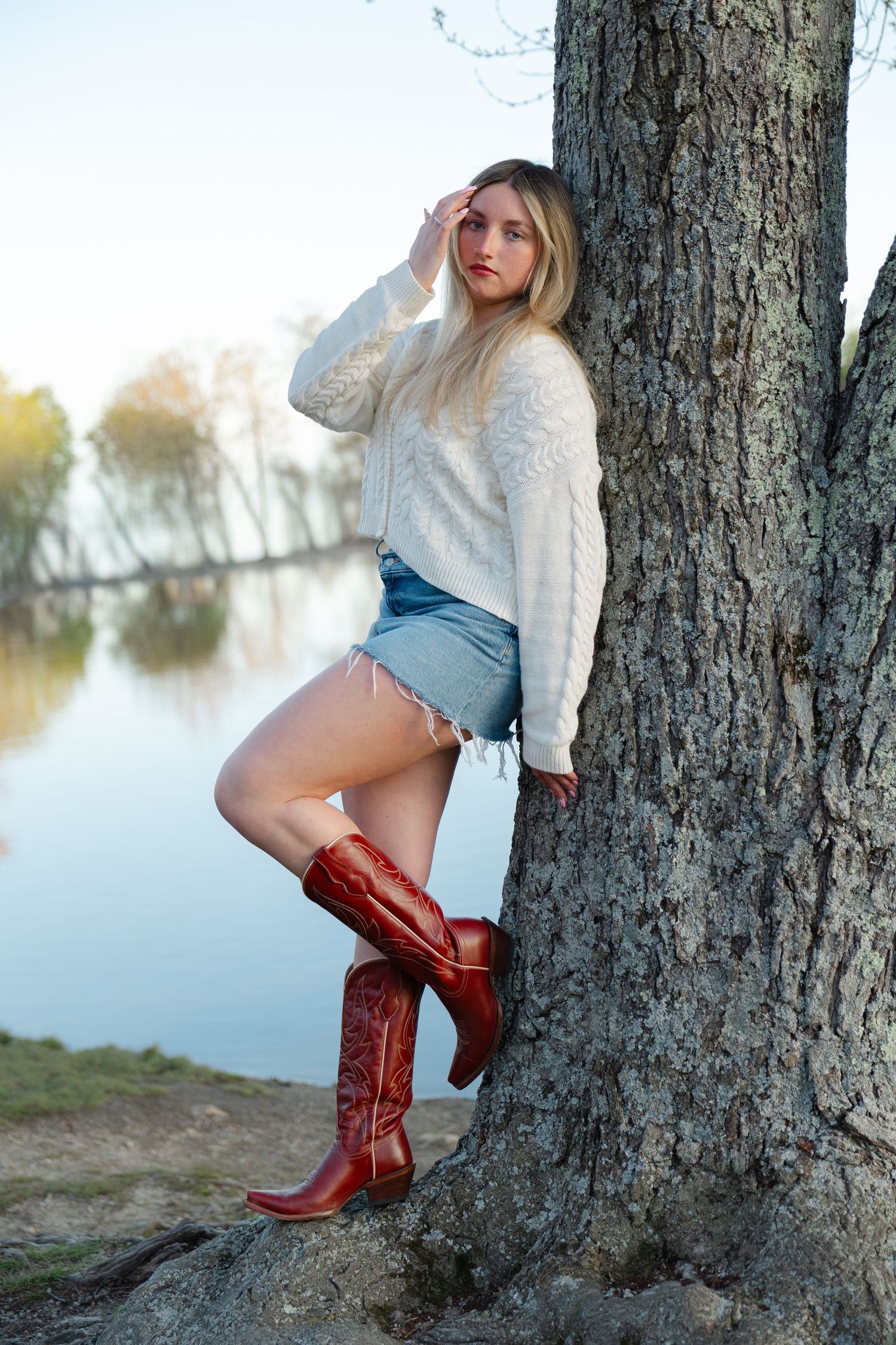 Lifestyle senior photography session in Massachusetts with candid outdoor portraits during golden hour.