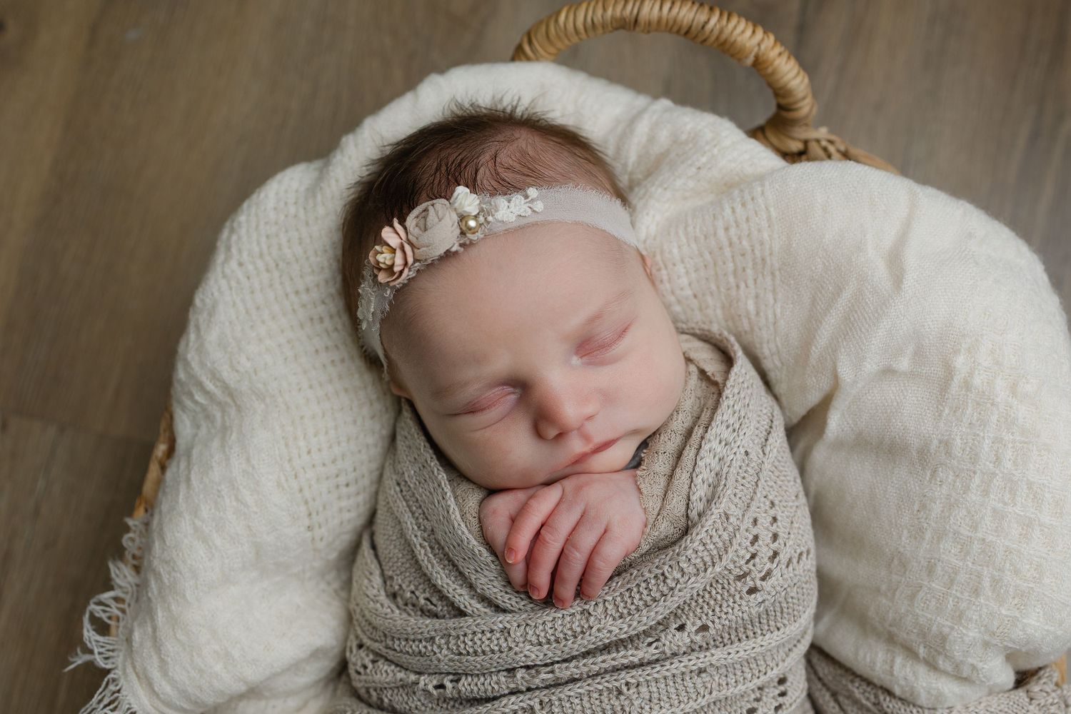 Sweet neutral newborn setup during studio newborn session in Minneapolis, Kansas