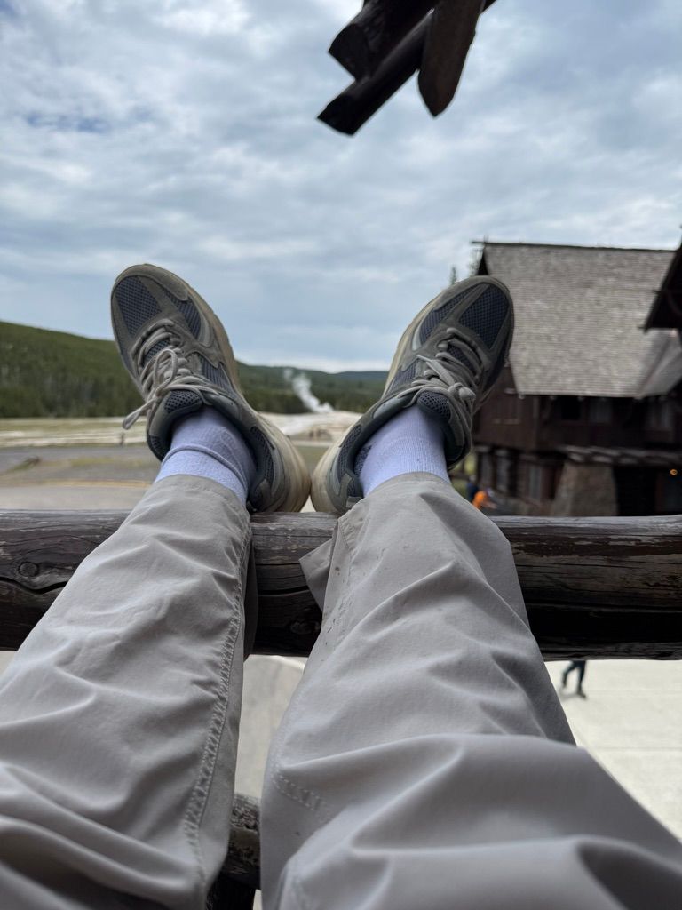 Carla resting her feet at Yellowstone Old Faithful Inn.