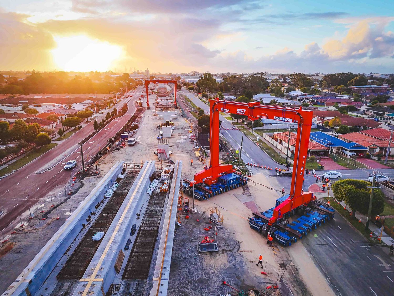 Drone picture of construction of elevated rail way at sunset in Perth, Western Australia