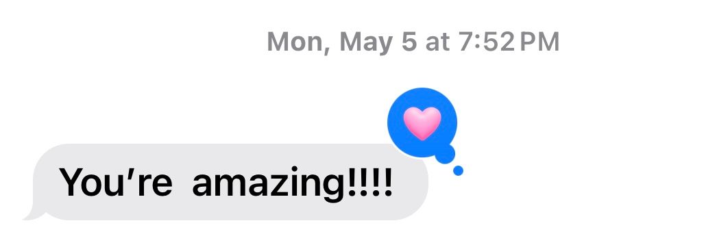 Messages showing conversation with heart reaction emoji and compliment saying 'You're amazing!!!!' on light gray background.