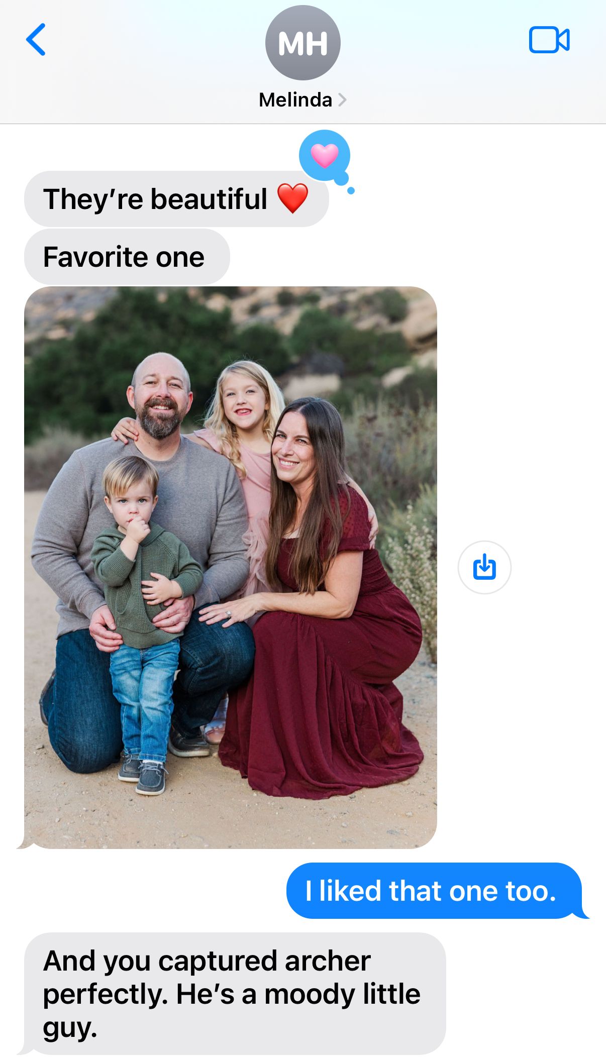 A text message conversation showing photo sharing between two people with blue chat bubbles on a white background.