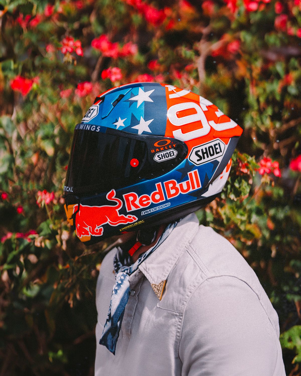 Close-up shots of a Red Bull branded motorcycle helmet with American flag design.