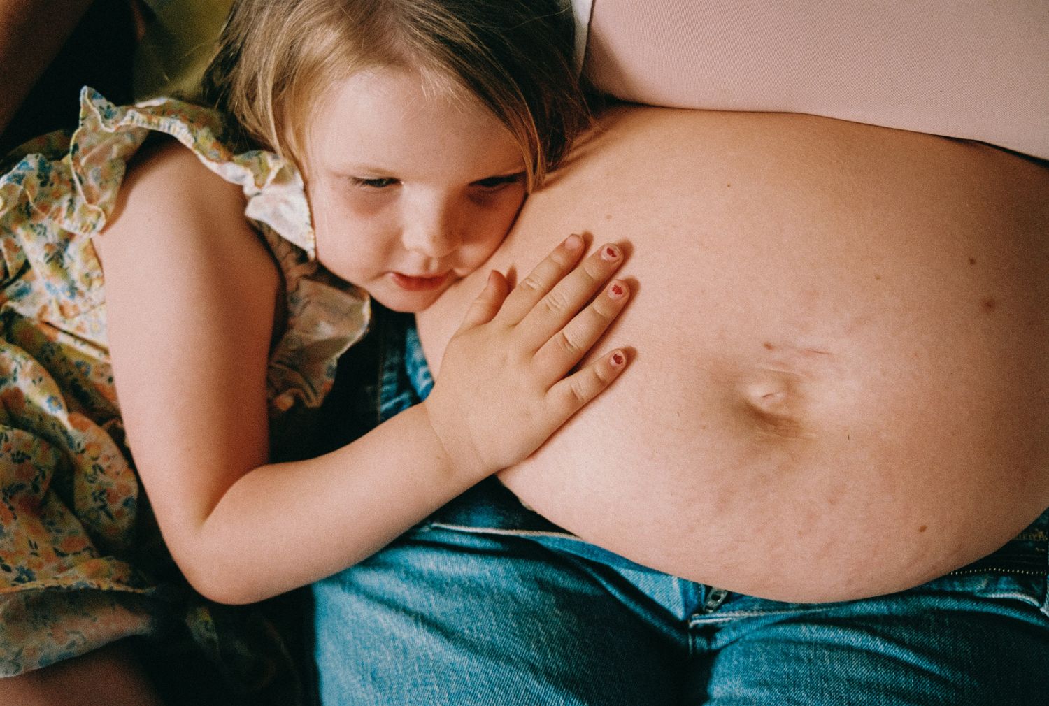 Series of intimate maternity photos showing a pregnant belly against soft natural lighting and neutral backgrounds.