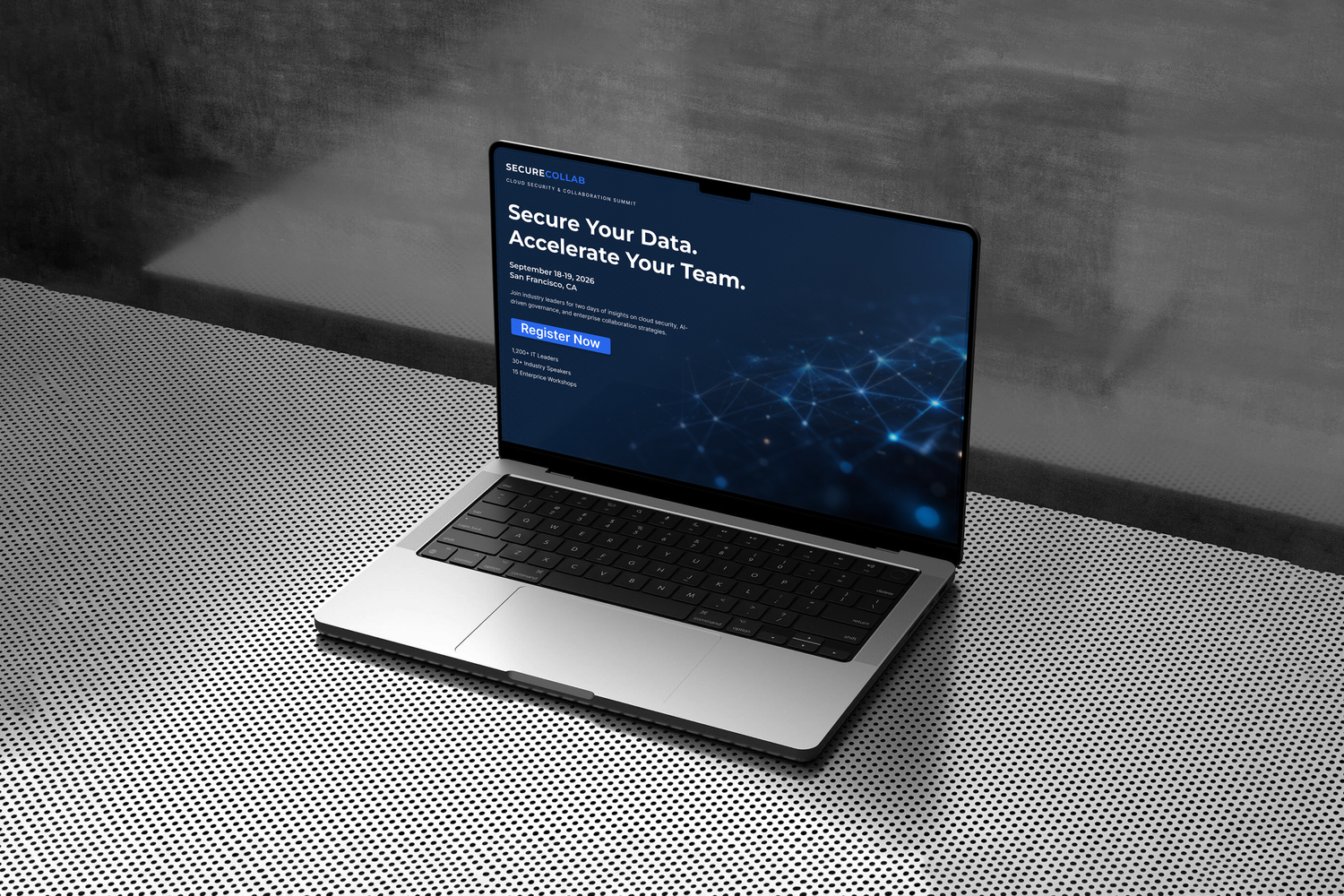 Modern laptop computer displaying a dark blue interface screen with network graphics on a textured silver surface.