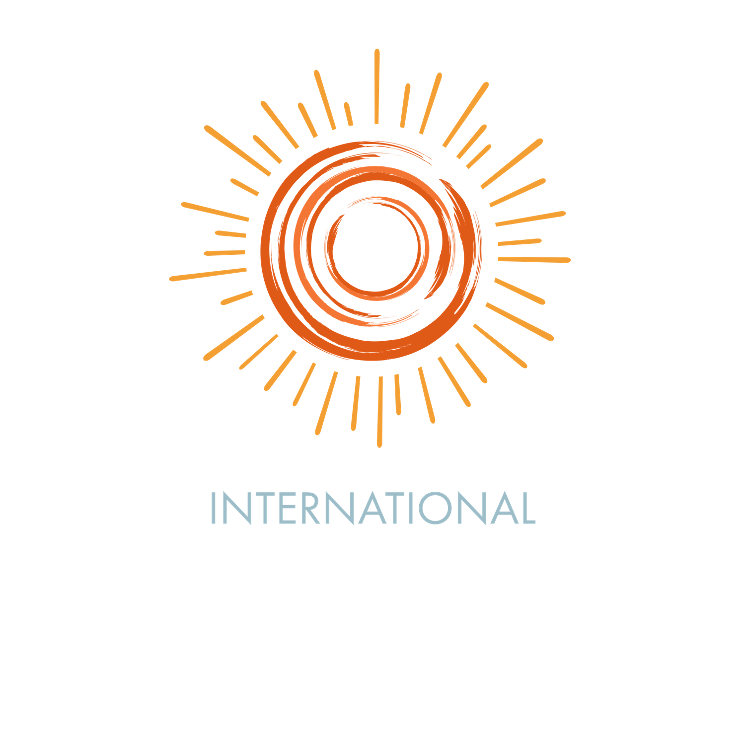 Simple orange and yellow sun-like circular logo design with radiating lines and text reading International.