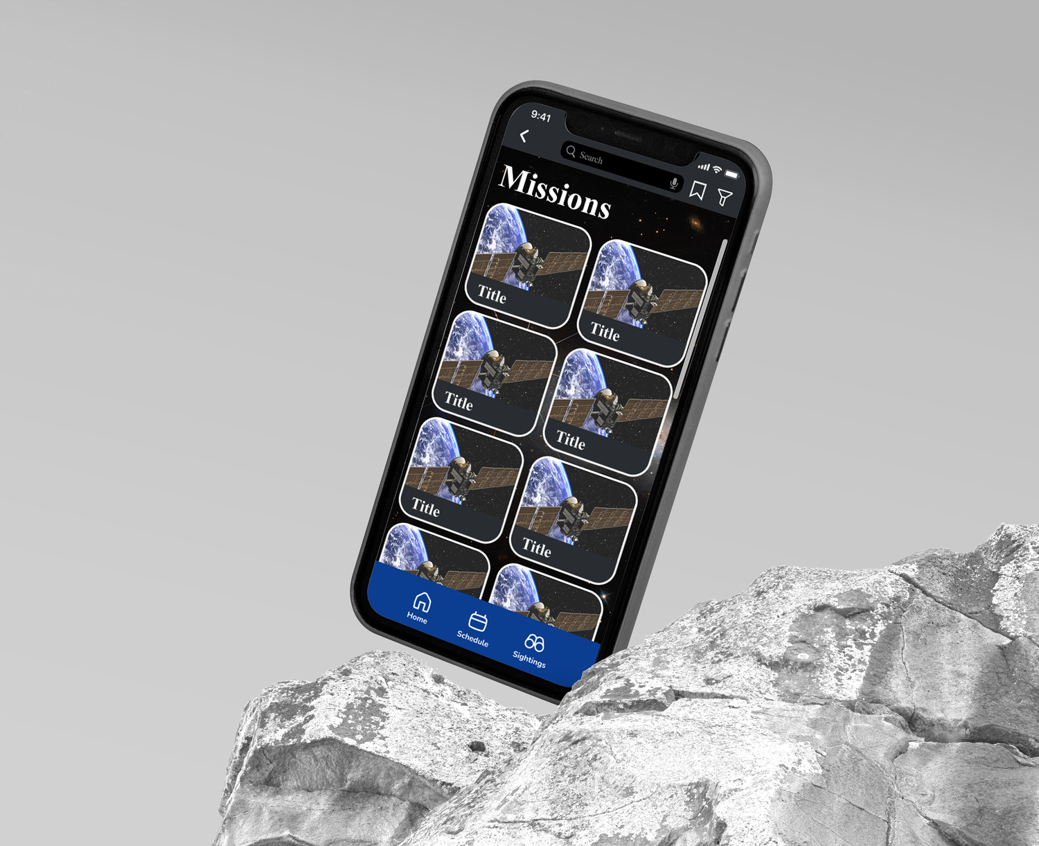 iPhone displaying a weather app interface with mountain images rests on a white textured surface.