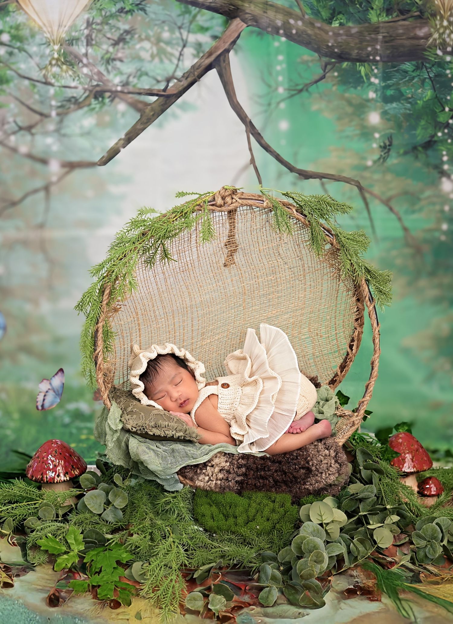 Newborn baby sleeping peacefully in a fairy-tale enchanted forest swing nest with mushrooms and greenery.