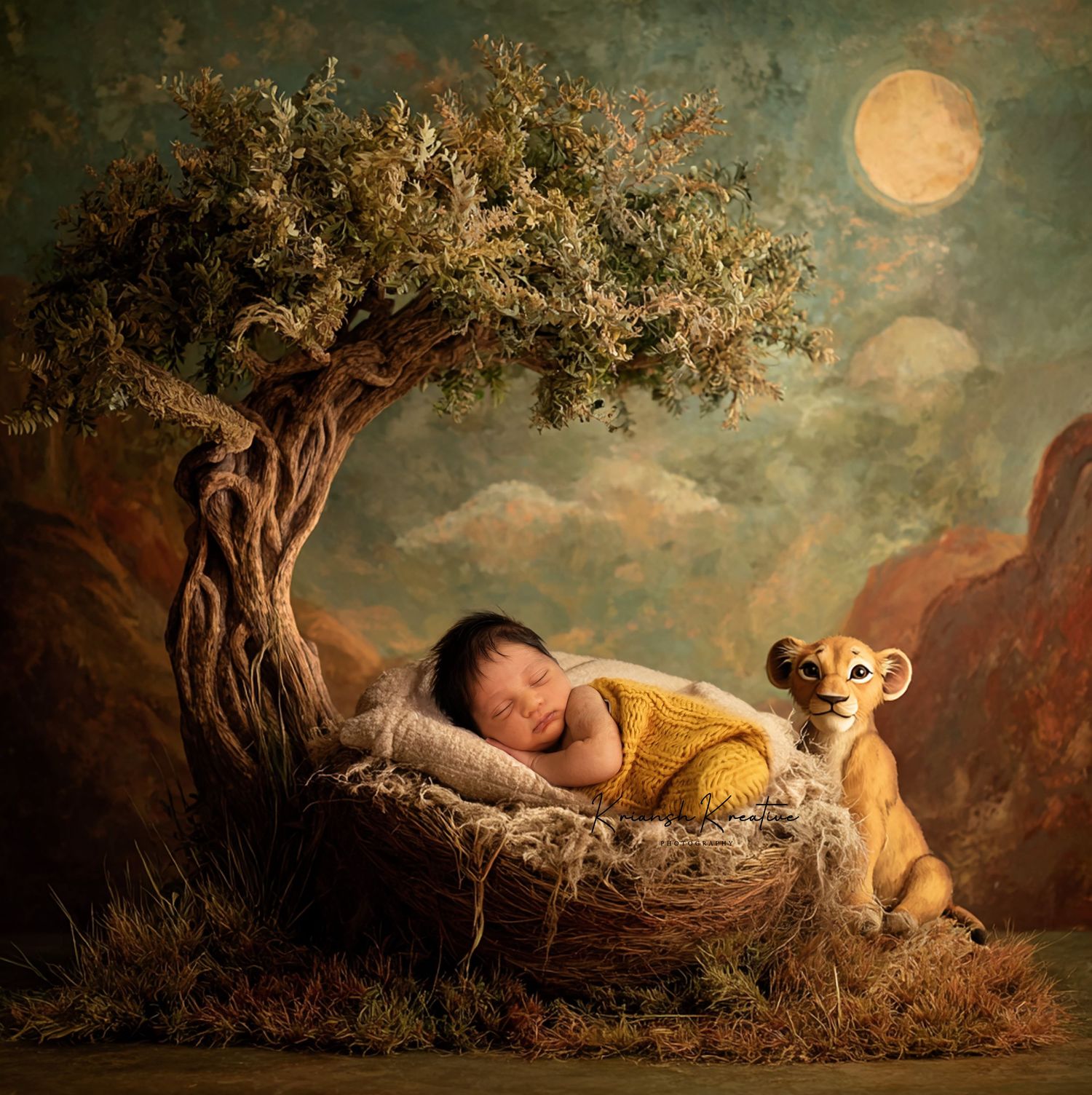 Newborn baby sleeping in a nest beside a Simba toy under a tree with a full moon in a Lion King themed photo.