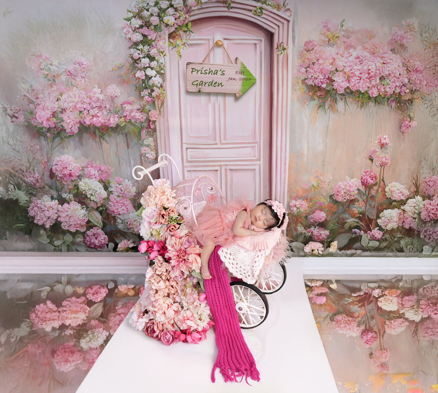 Romantic pink floral photo backdrop with vintage white door and cascading cherry blossoms in soft lighting.