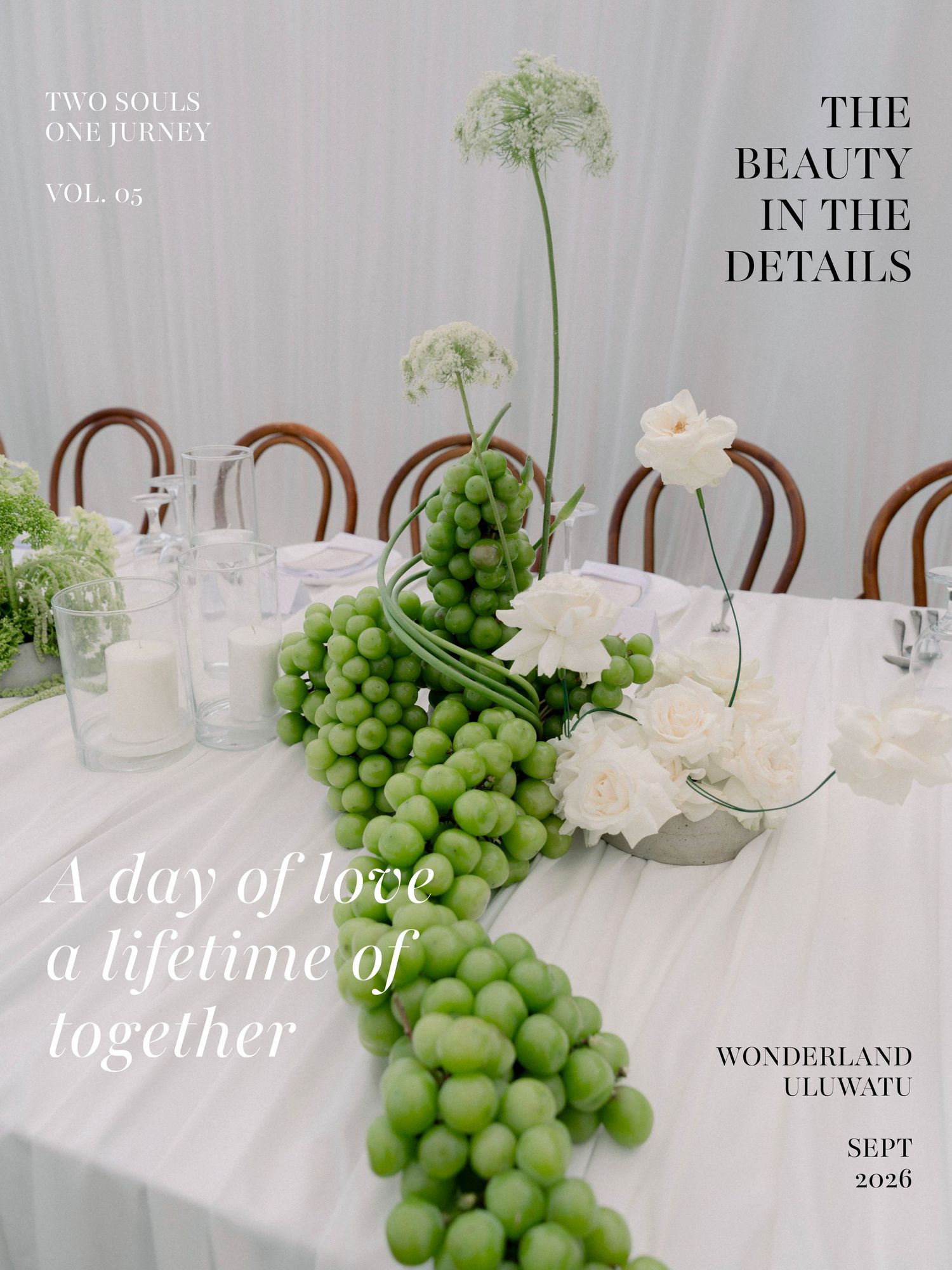 Elegant wedding tablescape with green grapes, white roses, and glass vases at Wonderland Uluwatu.